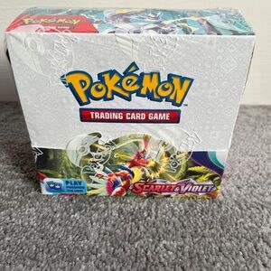 Pokémon Scarlet & Violet Card Game Box with Red and Blue Accents
